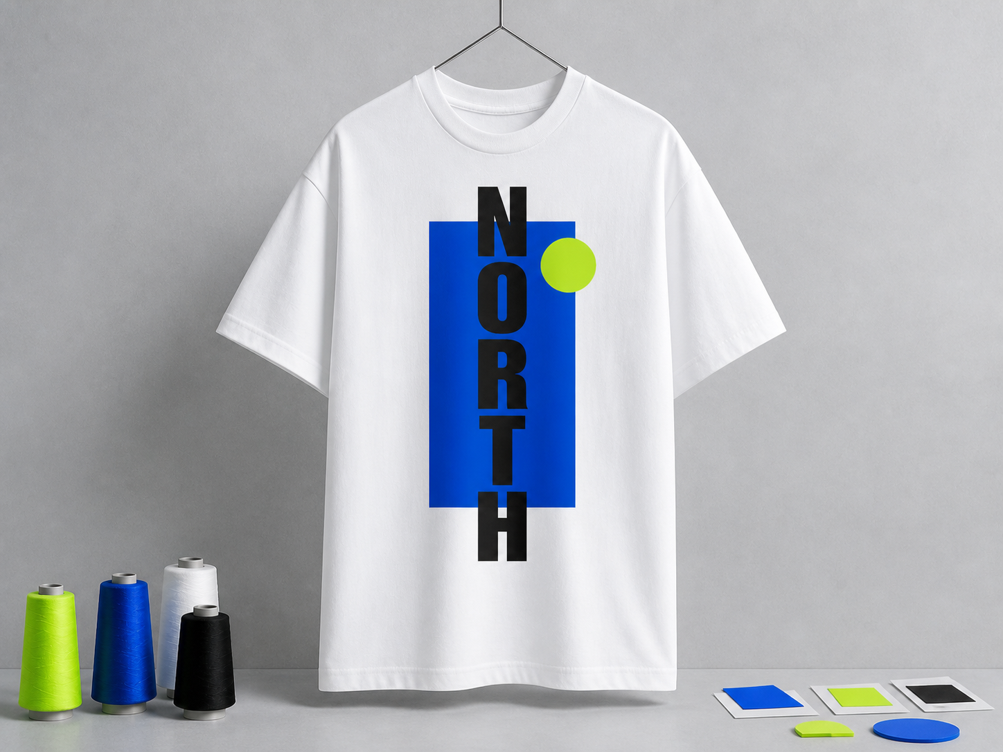 White T-shirt with the word NORTH over a cobalt rectangle